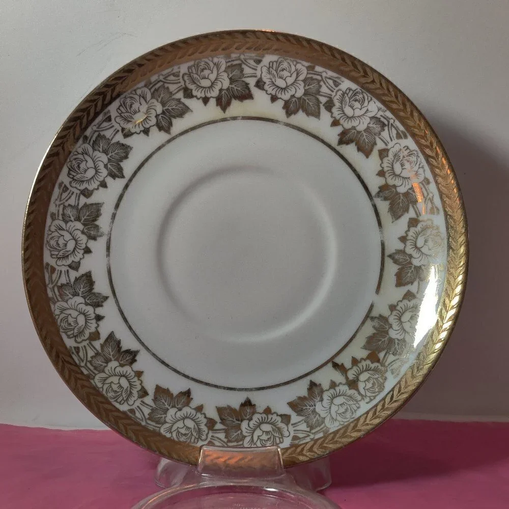 Limoge saucer made in Bavaria with gold embossed roses and leaves and vines. DP